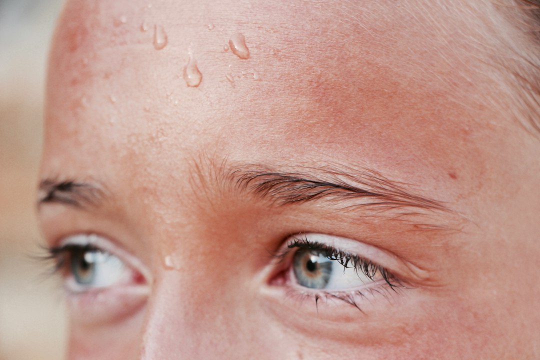 Close-up of perspiration on a person's forehead
